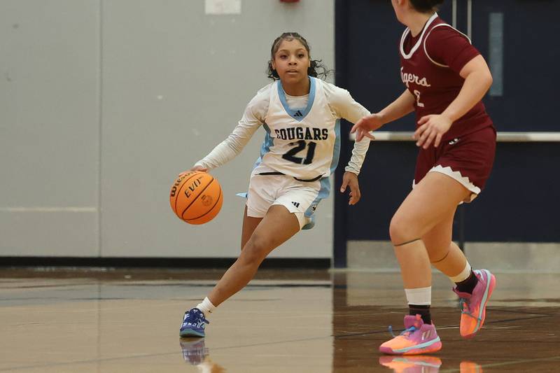 Plainfield South’s Tierra Abner works the ball upcourt against Plainfield North on Thursday, Jan 9, 2025.