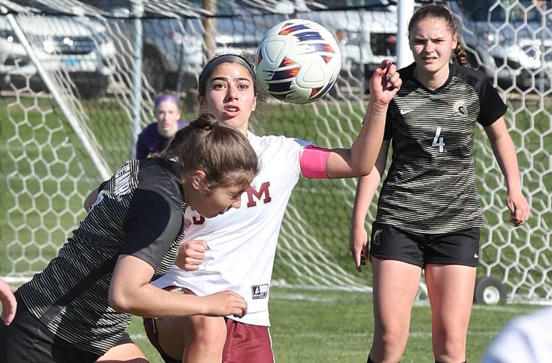 Sycamore's Mariana Martinez and Morris' Kendra Vasquez try to win the ball on a throw in during their Interstate 8 Conference Tournament semifinal game Wednesday, May 3, 2023, at Sycamore High School.
