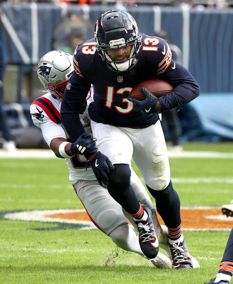 Chicago Bears wide receiver Keenan Allen tries to get away from a New England Patriot defender during their game Sunday, Nov. 10, 2024, at Soldier Field in Chicago.