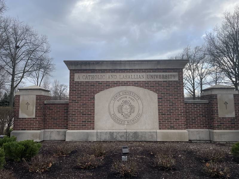 The entrance of Lewis University campus in Romeoville as seen on March 30, 2025.