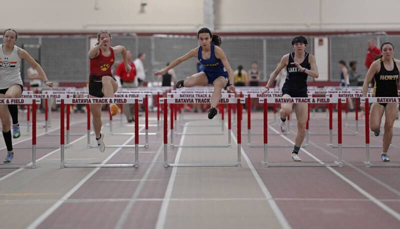Wheaton North’s Sophia Dalrymple sets a personal record and wins the 55-meter hurdles at the Dukane Conference girls indoor track and field meet at Batavia High School on Friday, March 15, 2024.