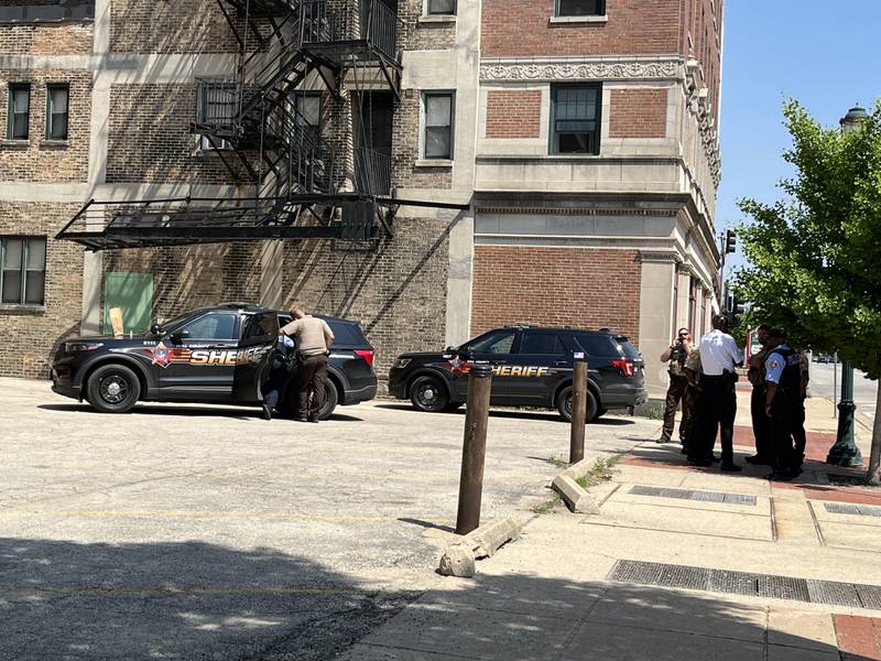 Will County sheriff's deputies and Joliet police officers on scene in downtown Joliet on Thursday, June 1, 2023. A suspect who fled from police was apprehended.