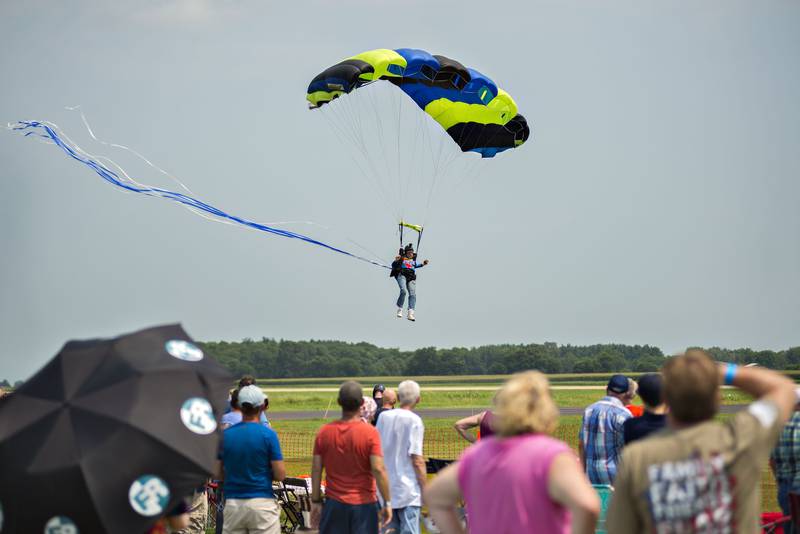 A member of the Misty Blues Skydiving team drops in at the start of the air show at Whiteside County Airport on Saturday, July 24, 2021.