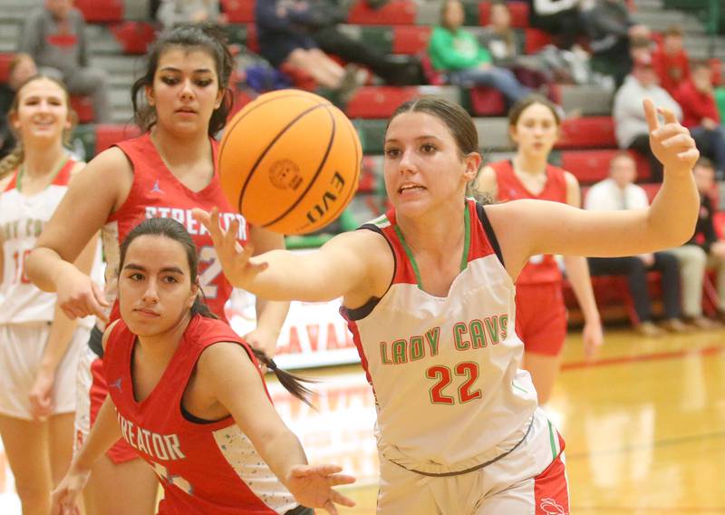 L-P's Brianna Ruppert grabs a rebound from going out of bounce as Streator's Isabel Gutierrez watches on Tuesday, Jan. 28, 2025 in Sellett Gymnasium at L-P High School.