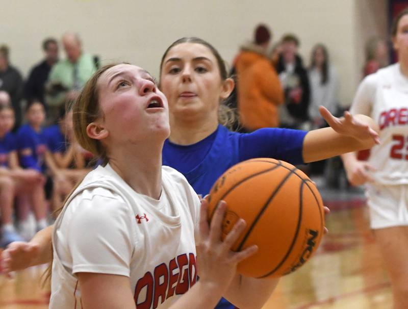Oregon's Addison Rufer looks to shoot against Genoa-Kingston on Friday, Jan. 30, 2026 at the Blackhawk Center.