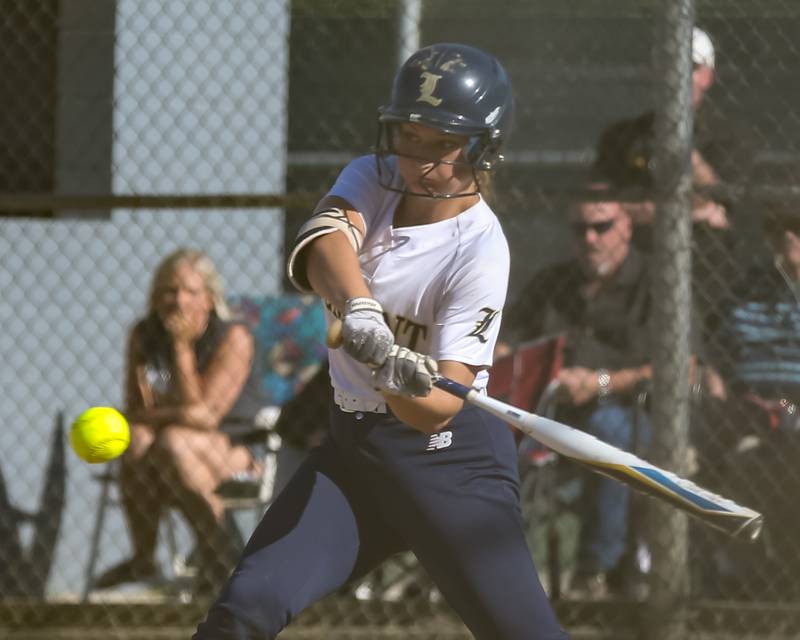 Lemont's Avaree Taylor (22) swings away during Class 3A Joliet Catholic Sectional final game between Marian Catholic at Lemont.  June 3, 2022.