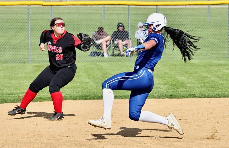 Princeton's Keely Lawson slides into second base for a steal as Hall's Avery Sondgeroth waits for the throw during the Tigresses' 15-0, four-inning victory on Thursday, May 7, 2026 in Princeton.