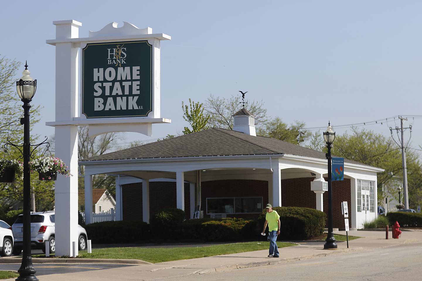 A man walks into Home State Bank on Thursday, May, 11, 2023, in Crystal Lake. With a number of bank collapses in recent months, local banks are telling their customers not to worry, as they are not plagued by the same problems that caused those other failures.