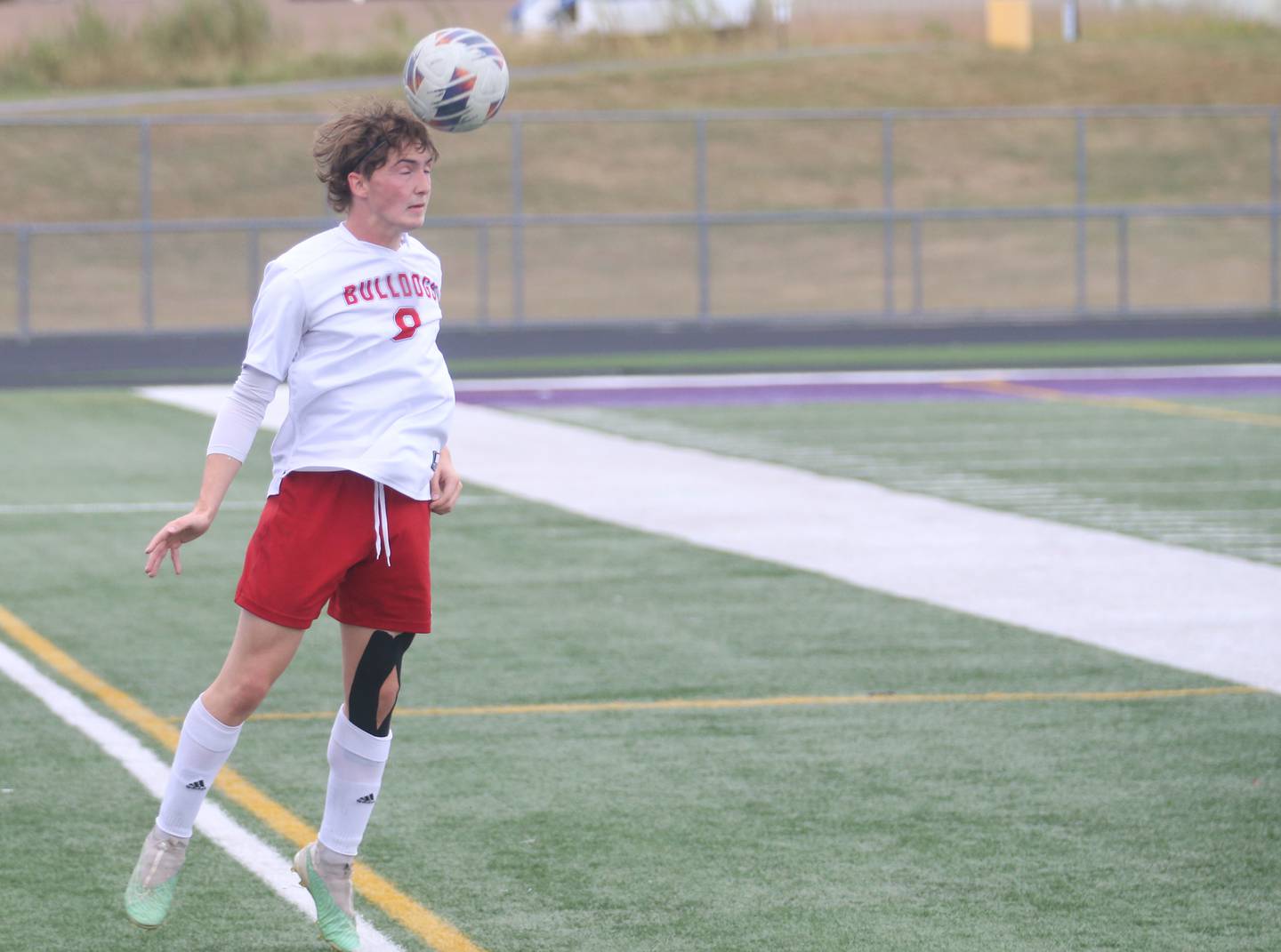 Streator's Noah Russow puts a header on the ball over Mendota on Monday, Sept. 23, 2024 at Mendota High School.