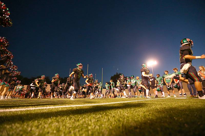L-P football players run onto the field on Friday, Sept. 30, 2022 at Howard Fellows Stadium in Peru.