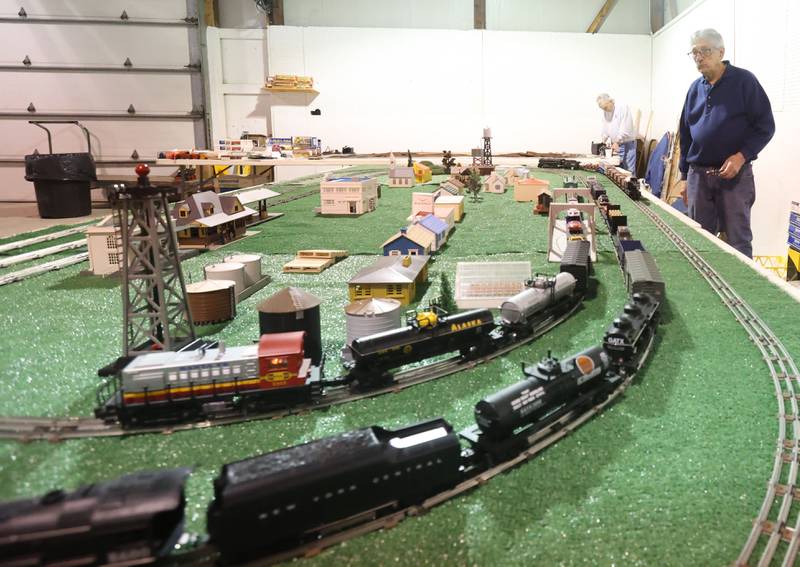 Mike Turczyn of Peru, sets up his Lionel O Guage train set during the Model Train and Toy Show on Saturday, Feb. 14, 2026 at the Bureau County Fairgounds in Princeton.