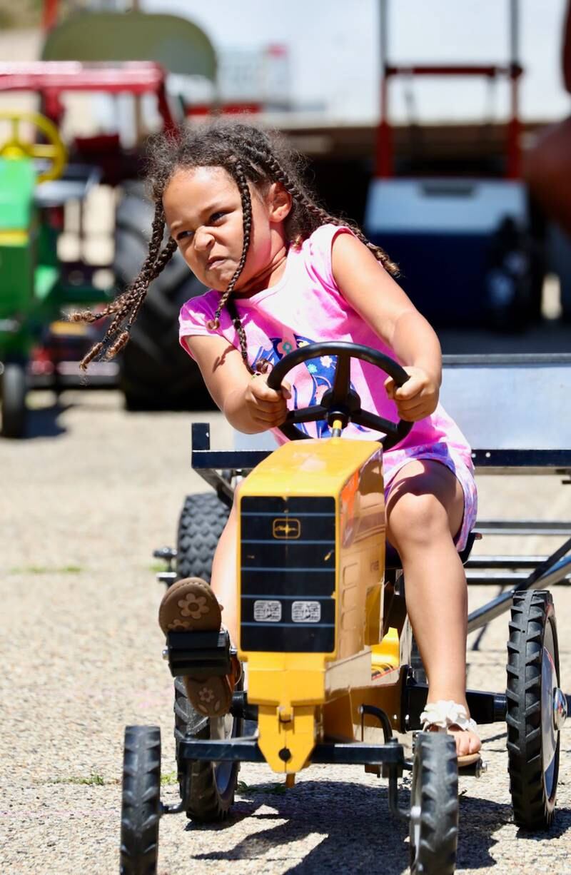 Kids were able to drive around individual tractors during Beef and Ag Days.