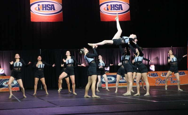 Members of the Benet Academy dance team perform during the IHSA State Dance finals on Saturday, Feb. 1, 2025 at Grossingers Motor Arena in Bloomington.