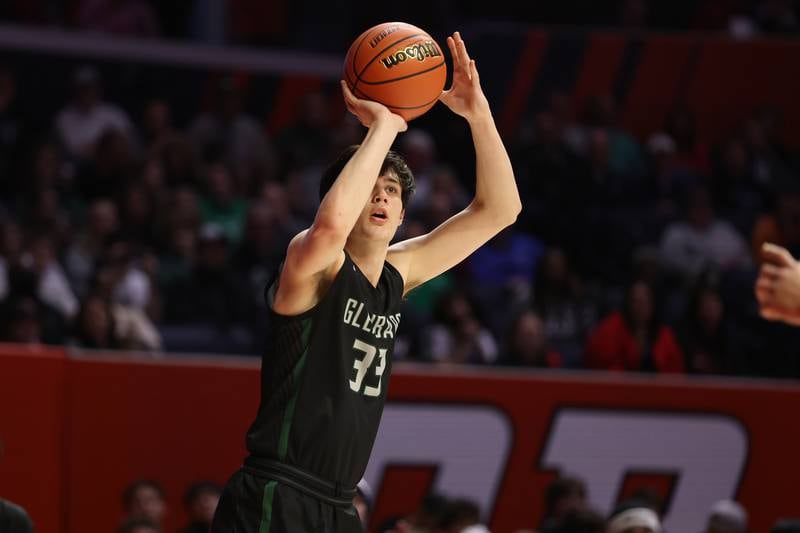 Glenbard West’s Braden Huff puts p a three point shot against Bolingbrook in the Class 4A semifinal at State Farm Center in Champaign. Friday, Mar. 11, 2022, in Champaign.