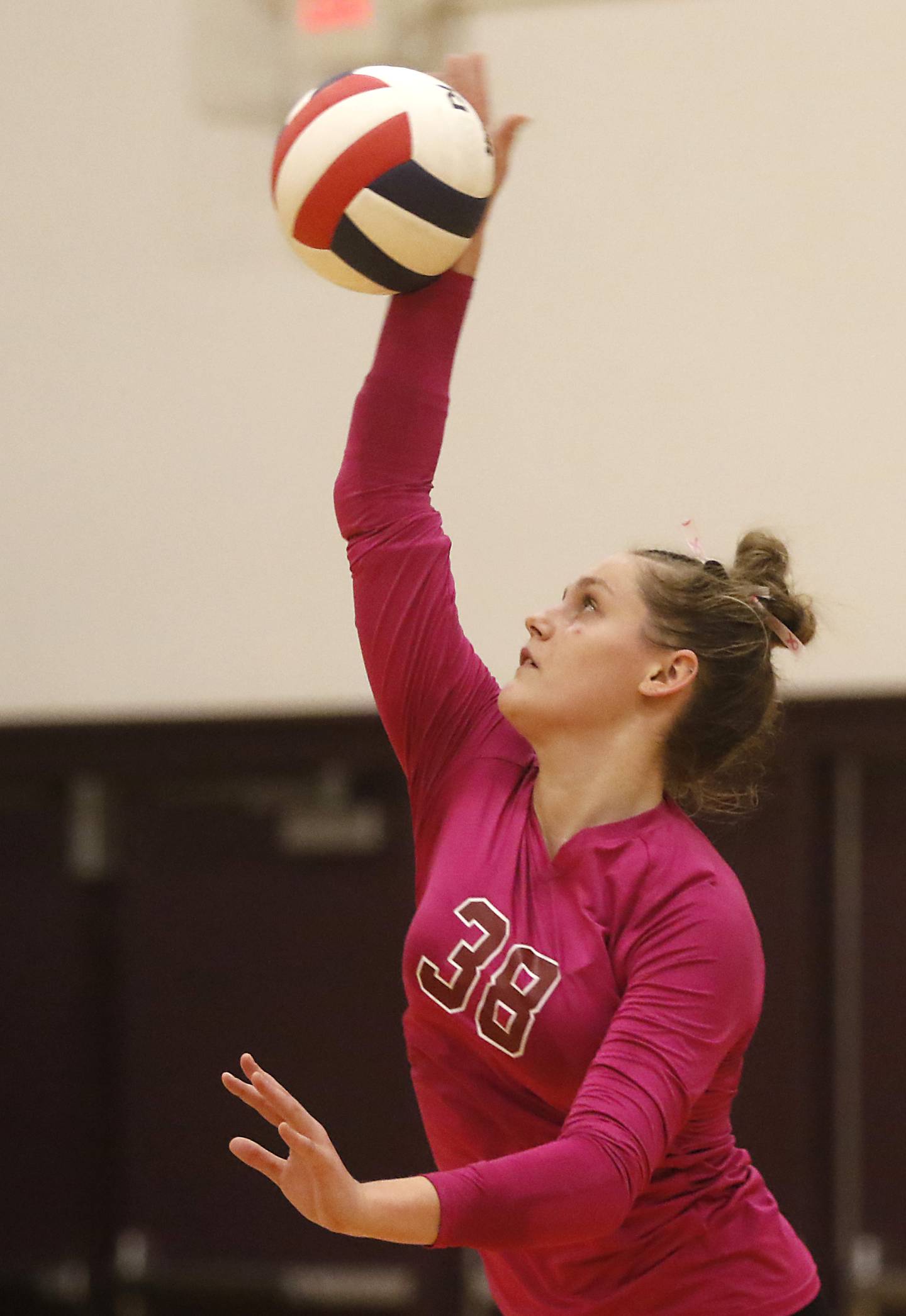 Richmond-Burton's Elissa Furlan serves the ball during a Kishwaukee River Conference volleyball match against Woodstock North  Wednesday, Oct.11, 2023, at Richmond-Burton Community High School.