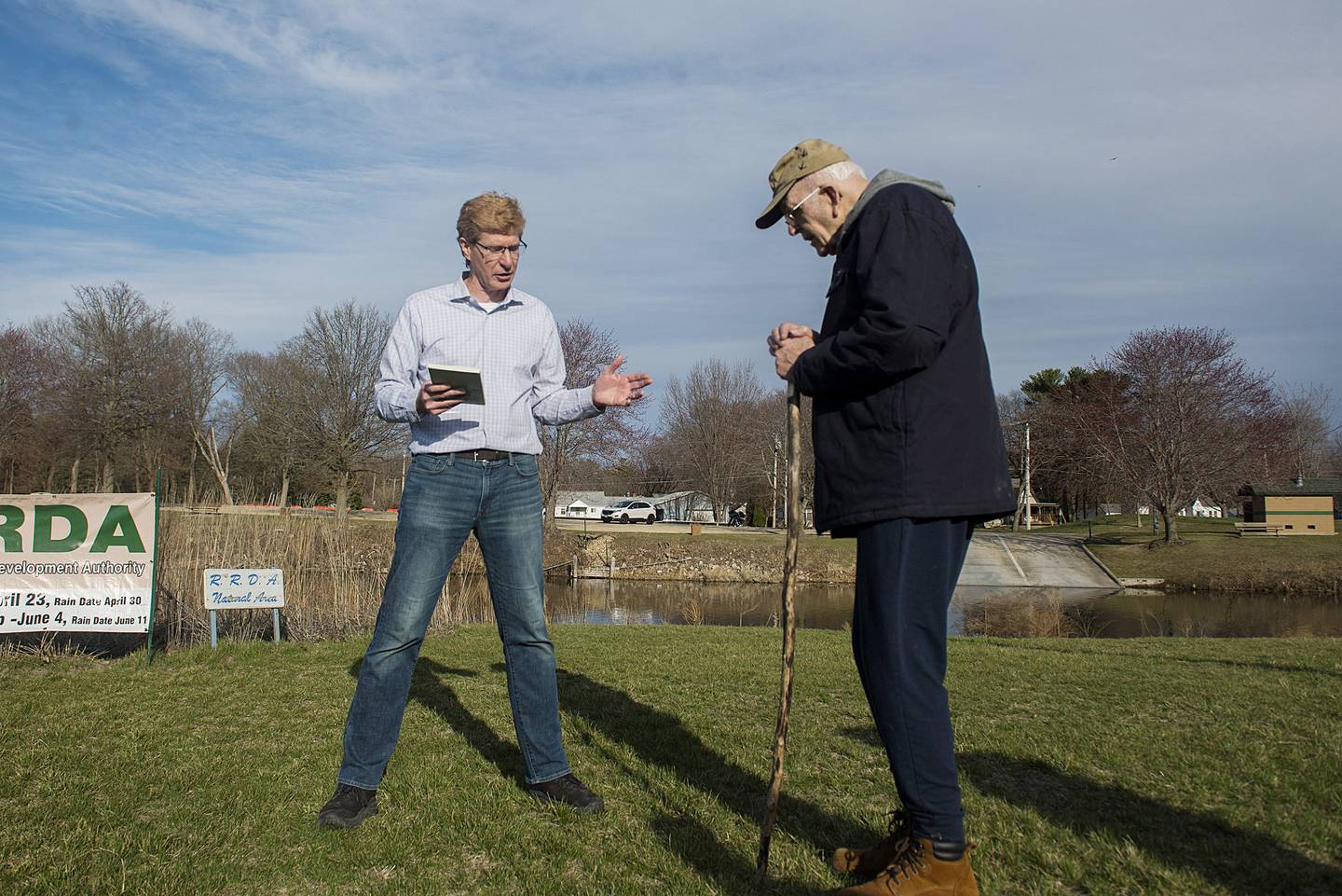 James Marks (left), secretary of the Rock River Development Authority (RRDA), speaks Tuesday, April 11, 2022 about the long list of contributions Tim Keller (right) has made for local natural grass conservation. Keller, founded the Whiteside chapter of the Natural Area Guardians and has had great input on the Nachusa grasslands, Byron Forrest Preserve and the Sauk Valley College prairie grass restoration area was honored by the RRDA with a lifetime achievement award.