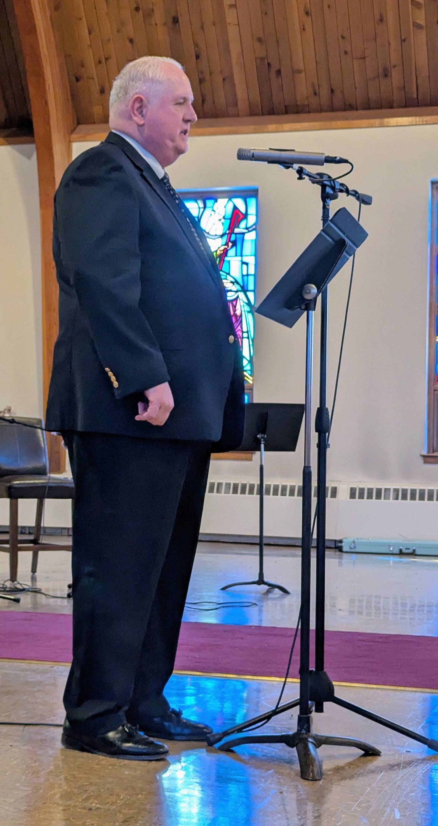 Mark Mench, a student of Mardi Huffstutler, sings during the Woodlawn Arts Academy winter music recital at St. Paul Lutheran Church, Sterling.