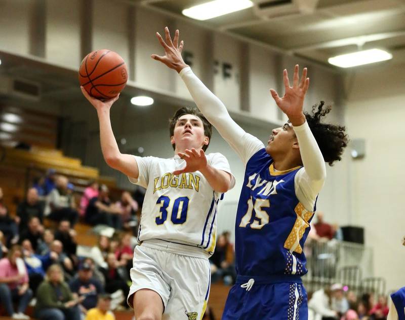 Logan eighth-grader Deacon Gutshall goes up for a layup during Tuesday's Fight like Erin Night at Prouty Gym against LaSalle Lincoln.