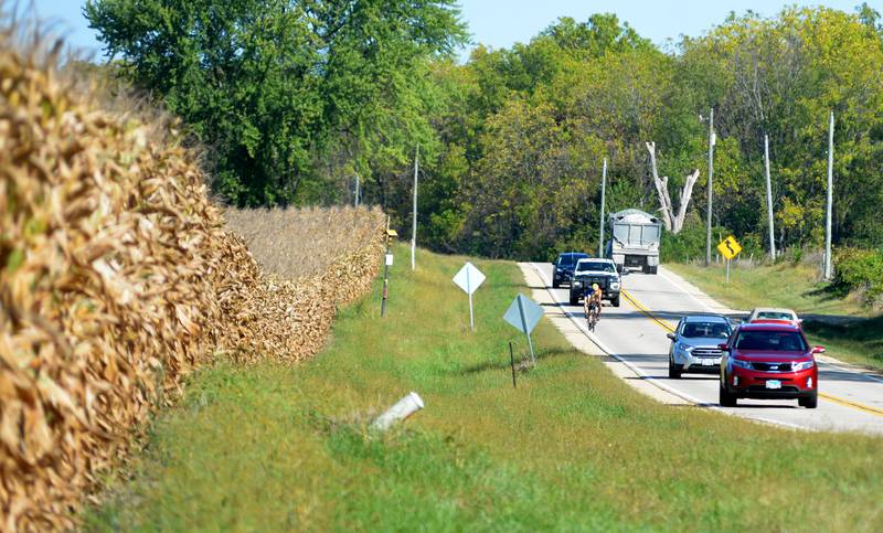 A bicyclist rides south on Ridge Road into Grand Detour as part of the 10th annual TOSOC (Tour of Scenic Ogle County) on Saturday, Sept. 27, 2025.