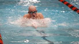 Photos: IHSA state swimming meet preliminaries