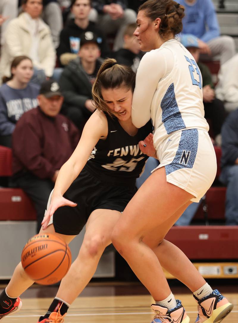 Fenwick's Cam Brusca (25) runs into Nazareth's defense during the girls 3A varsity super-sectional game between Nazareth Academy and Fenwick High School in River Forest on Monday, Feb. 27, 2023.
