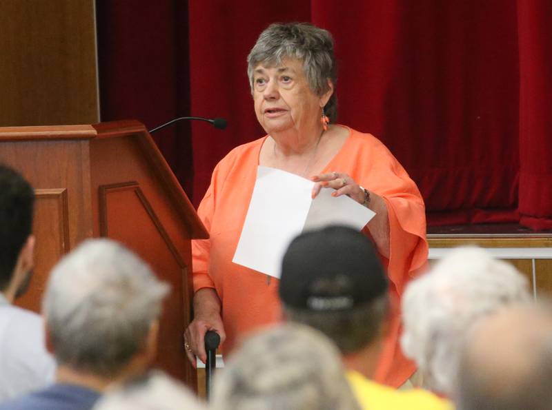 Ruch Capsel speaks to the Illinois Health Facilities and Services Review Board during a public hearing regarding OSF St. Elizabeth Hospital's plans to reduce services on Tuesday, June 10, at Central Intermediate School in Ottawa.