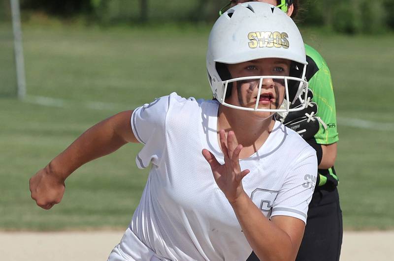 Sycamore Sycos' Makayla Jonutz heads for third Friday, June 24, 2022, during their 12u game against the Forest City Toxic in the 22nd annual Storm Dayz tournament at the Sycamore Community Sports Complex.