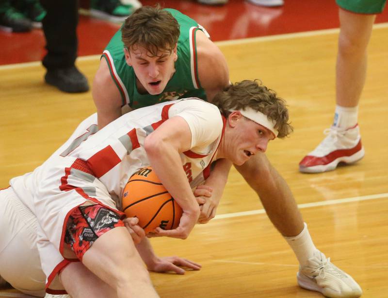 Morton's Collin Burns grabs a loose ball away from L-P's Jameson Hill during the Class 3A Sectional semifinal game on Tuesday, March 3, 2026 in Kingman Gymnasium at Ottawa High School.