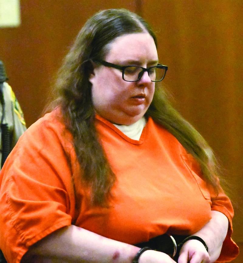 Sarah Safranek is escorted into a courtoom at the Ogle County Judicial Center on Wednesday, Oct. 29, 2025 for a pretrial hearing. She is charged with killing her 7-year-old son in 2021.