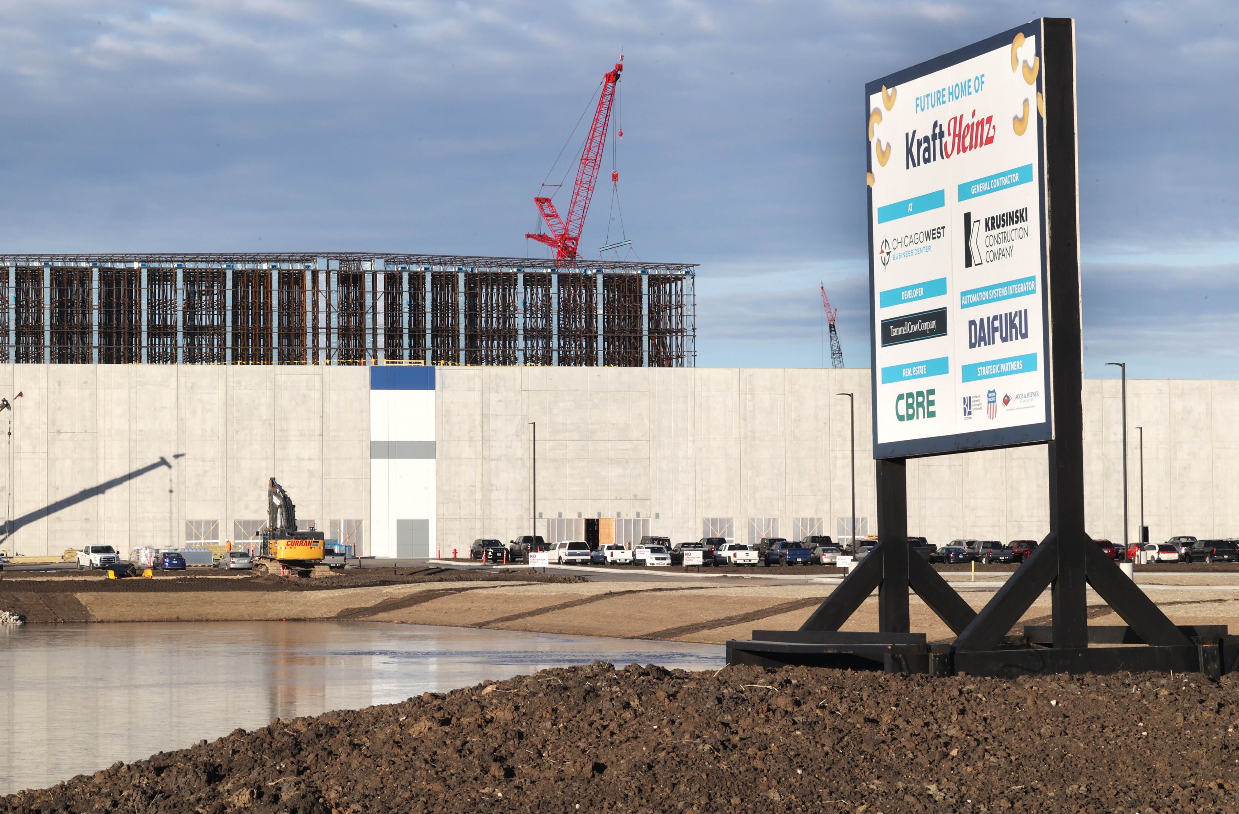 Work continues at the site of the Kraft Heinz Company distribution center Wednesday, Dec. 13, 2023, in the ChicagoWest Business Center in DeKalb.