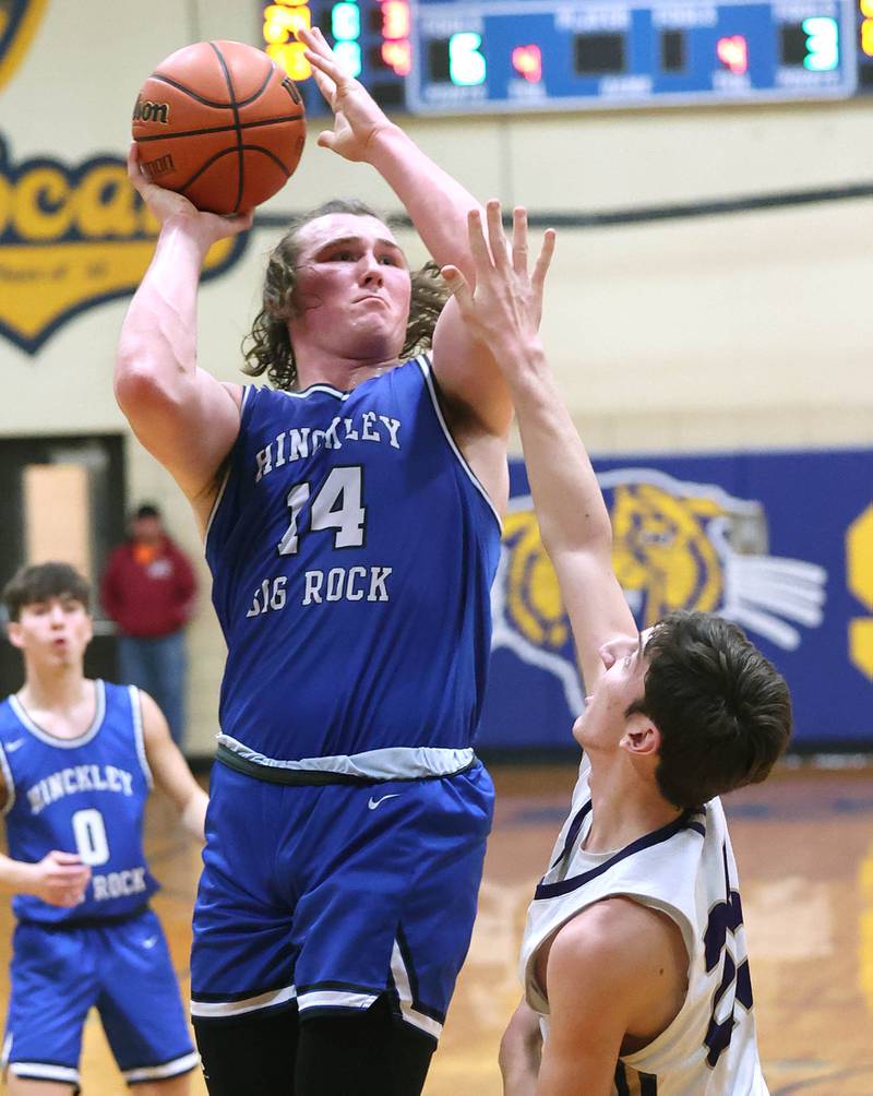 Hinckley-Big Rock's Martin Ledbetter shoots over Serena's Richie Armour Friday, Feb. 3, 2023, during the championship game of the Little 10 Conference Basketball Tournament at Somonauk High School.