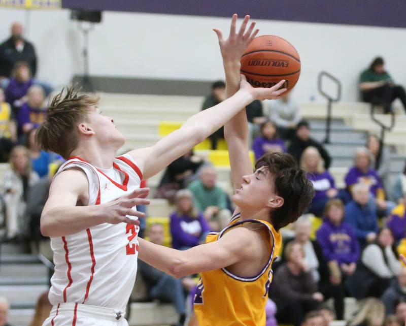 Ottawa's Owen Sanders beats Mendota's Alex Beetz to a rebound on Tuesday, Feb. 13, 2024 at Mendota High School.