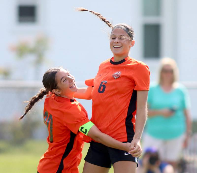 Crystal Lake Central’s Ella Bechler, right, is greeted by Addison Schaffer, left, after a Bechler goal against Hononegah in IHSA Class 2A Sectional Semifinal girls soccer on Monday, May 25, 2026 at Crystal Lake Central High School in Crystal Lake.