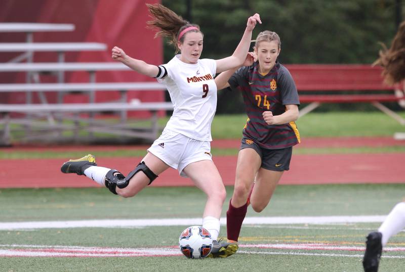 Montini's Maren Hoovel takes a shot in front of Richmond-Burton's Ember Demers Friday, May 27, 2022, during their IHSA Class 1A state semifinal game at North Central College in Naperville.