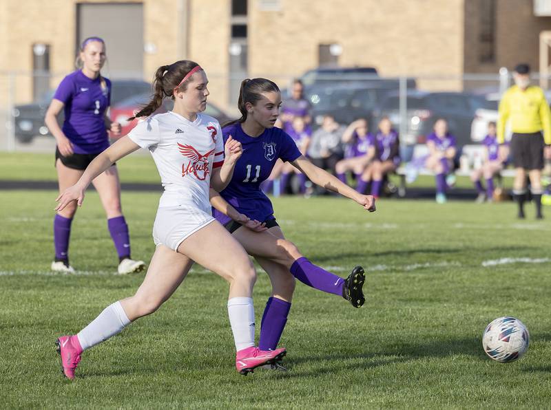 Dixon’s Leah Stees takes a shot as Oregon’s Anna Stender works to defend Thursday, April 25, 2024 at Dixon High School.