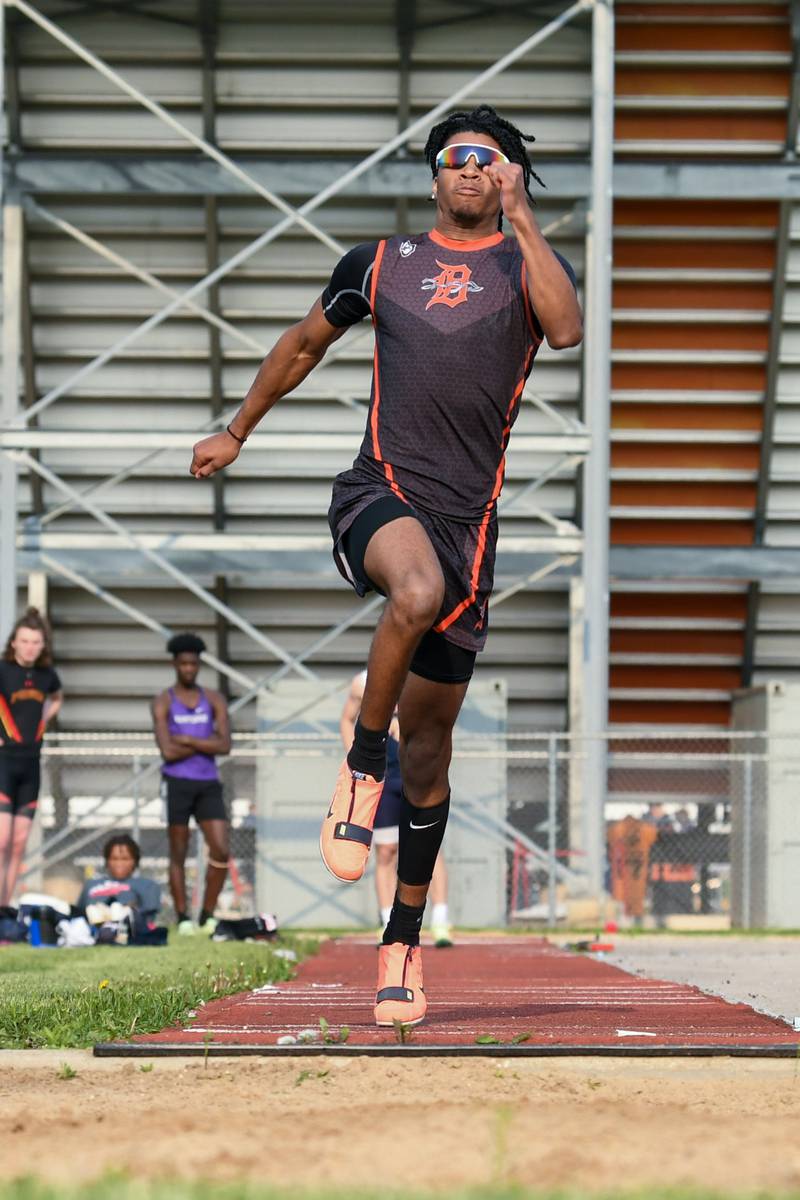 Ethan McCarter of DeKalb competes in the long jump Thursday May 17th at the DeKalb sectional meet.