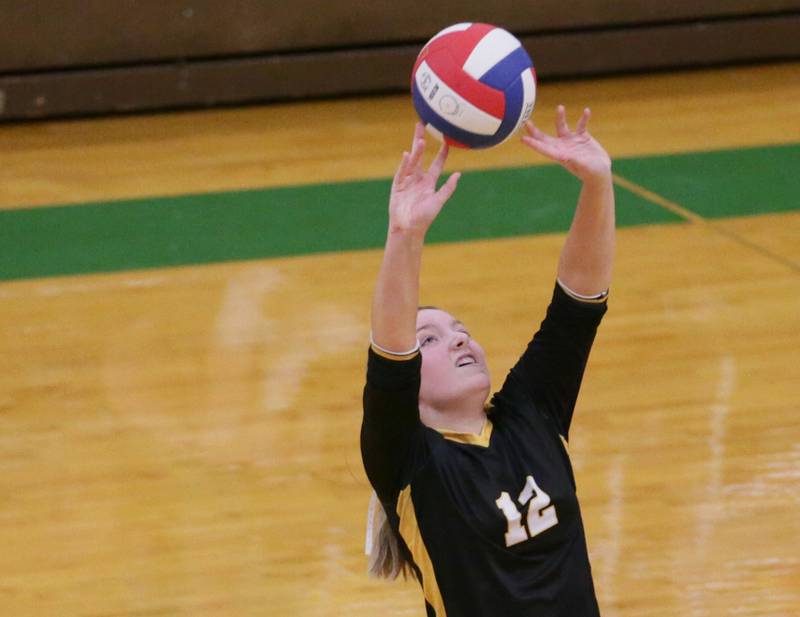 Putnam County's Tori Balma sets the ball in play in the Tri-County Conference Tournament on Monday, Oct. 10, 2022 in Seneca.