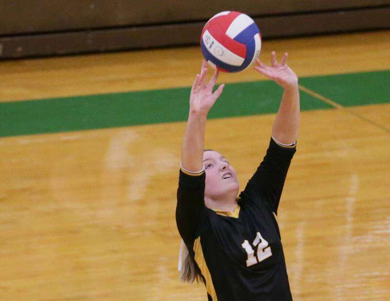 Putnam County's Tori Balma sets the ball in play in the Tri-County Conference Tournament on Monday, Oct. 10, 2022 in Seneca.
