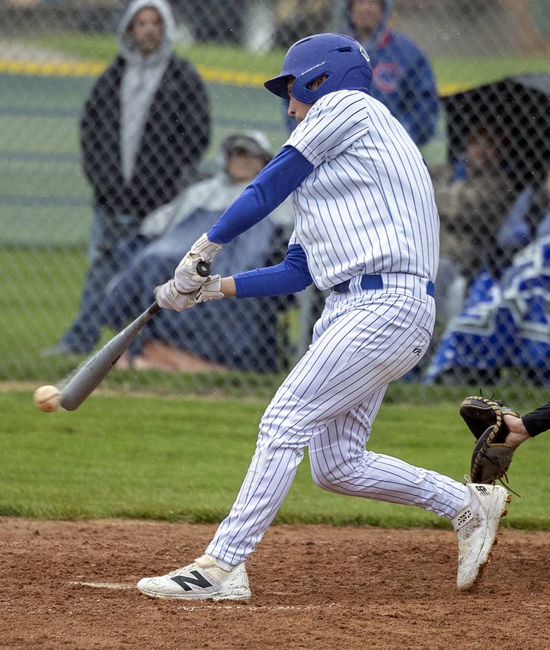 Newman’s Evan Bushman drives in a run on a fielder’s choice against Mendota Thursday, April 30, 2026.