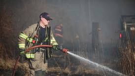 Photos: Fighting a brush fire near Harvard