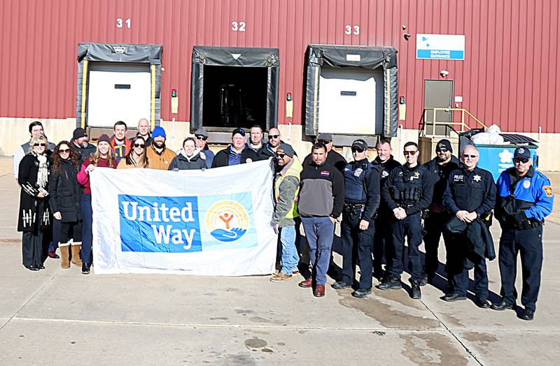 United Way of the Illinois Valley, Illinois Valley Building Trades, along with police departments from Peru, Tonica, Spring Valley, La Salle helped fill semi trucks filled with toys donated 25,000 toys and 625 bicycles that were donated by Flat River Group from Michigan on Thursday, Dec. 1, 2022 at DD Warehouse in Peru.