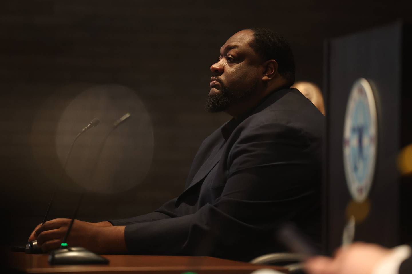 City Council candidate Christopher Parker attends a hearing on the validity of his nominating petitions at the Joliet City Electoral Board meeting on January 4th.
