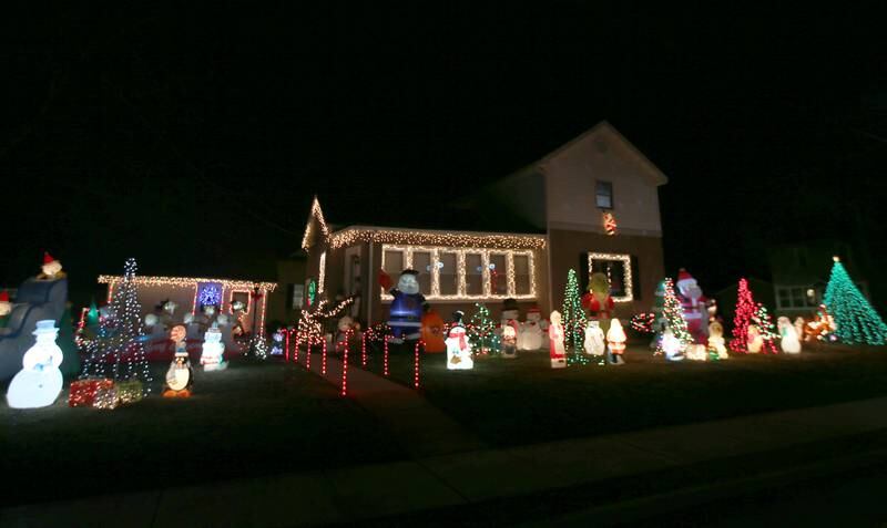 Christmas decorations fill the yard and home on Tuesday, Dec. 20, 2022 located 926 Fulton Street in Peru.