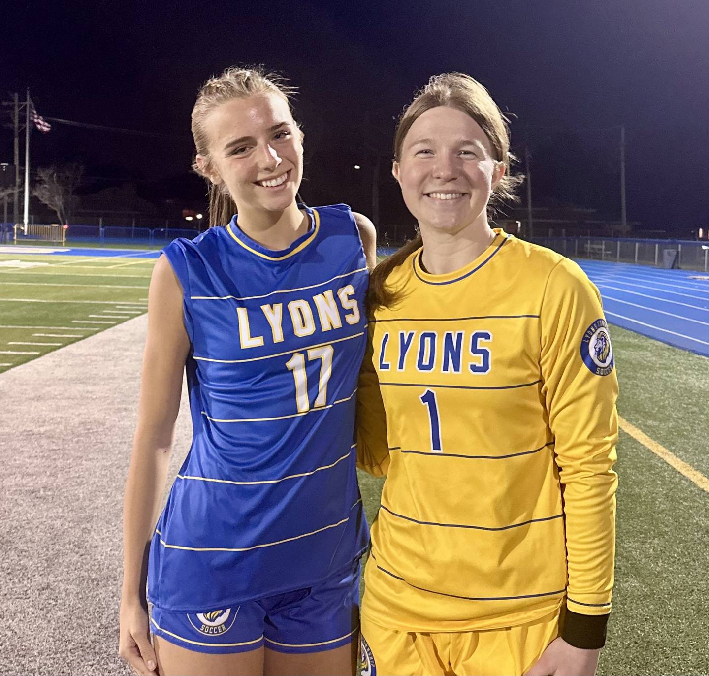 Lauren Salvino (left) scored in the first half and Anna Bigenwald (right) totaled 10 saves as Lyons drew Wheaton Warrenville South 1-1 on Wednesday.