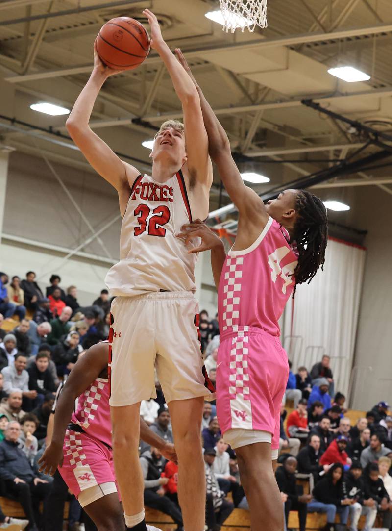 Yorkville’s Jason Jakstys (32) takes it to the basket against Whitney Young during the When Sides Collide Shootout on Saturday, Jan. 20, 2024 in Lisle, IL.