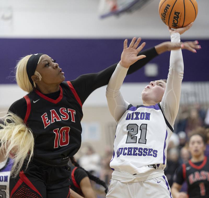 Dixon’s Reese Dambman works against Rockford East’s Jasmine Fruland Monday, Feb. 16, 2026.