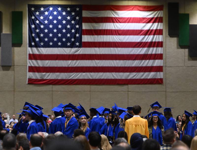 Wheaton North graduates take their seats during the commencement ceremony on Saturday, May 24, 2025 at College of DuPage in Glen Ellyn.