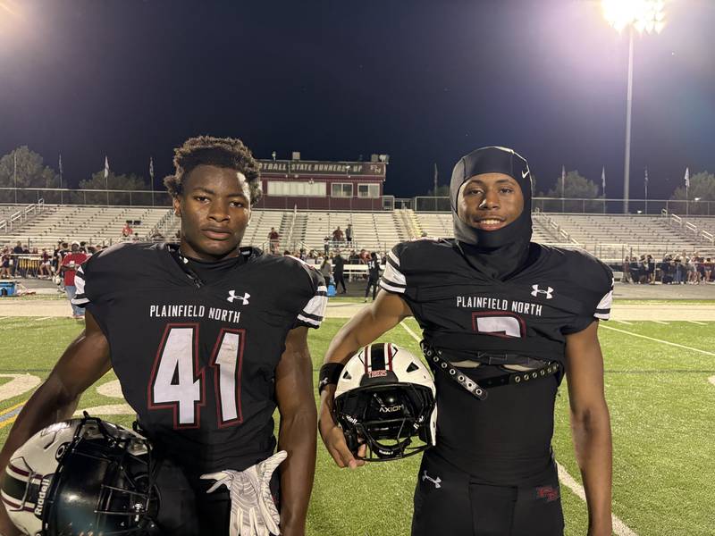 Plainfield North’s Aaron Babino (left) and Marriel Macon (right) powered the Tigers’ ground game, combining for a majority of the team’s points in the 42-7 homecoming win over Plainfield East.
