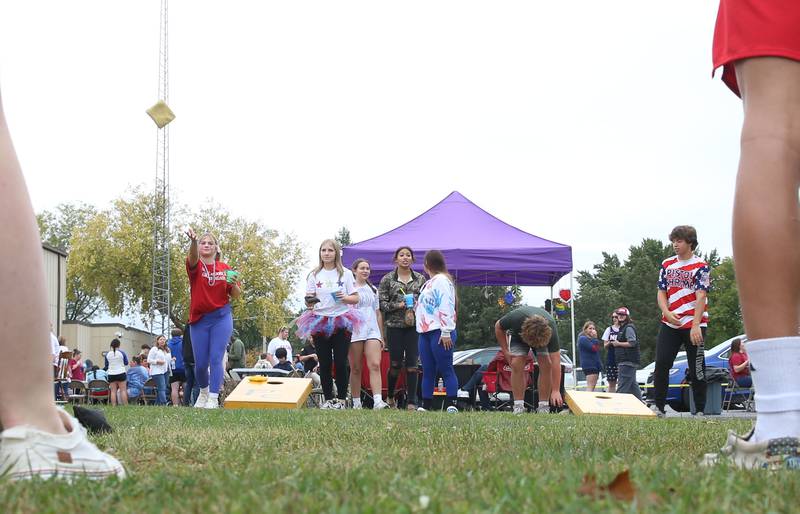 Putnam County High School Students throw corn hole bags while attending the first annual Homecoming Parking Lot Party and Food Truck Festival on Monday, Sept. 23, 2024 at Putnam County High School. The Putnam County High School Student Council and the Work-Based Learning Program came up with the idea.