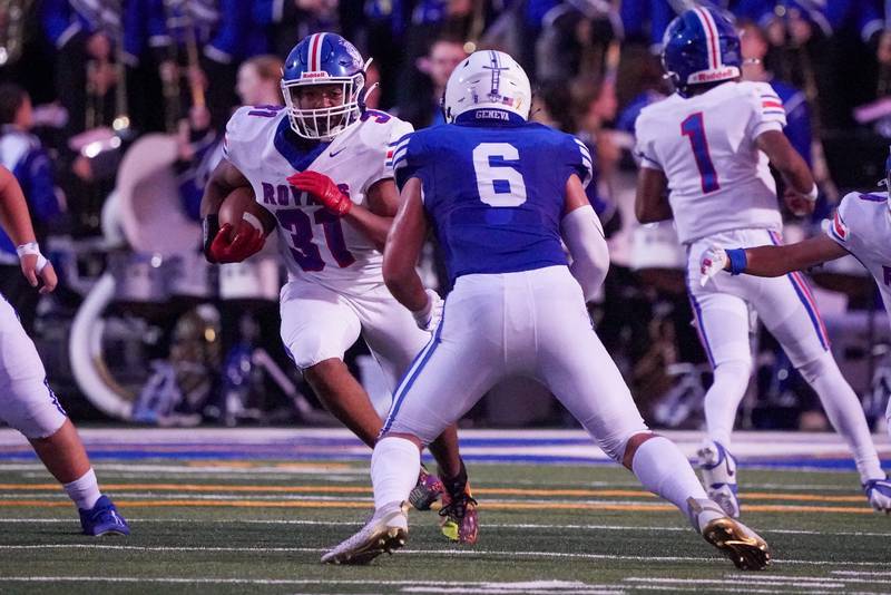 Larkin’s Devin Krueger (31) carries the ball against Geneva during a football game at Geneva High School on Friday, Aug 30, 2024.